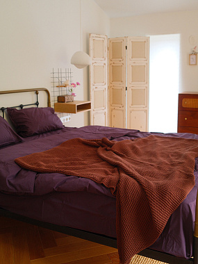 картинка Плед из хлопка жемчужной вязки терракотового цвета из коллекции Essential от магазина Tkano