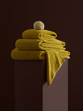 картинка Полотенце банное цвета охры из коллекции Essential от магазина Tkano