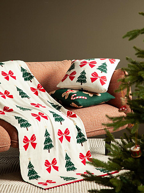 картинка Плед из хлопка с новогодним рисунком Christmas Bows из коллекции New Year Essential, 130x180 см от магазина Tkano